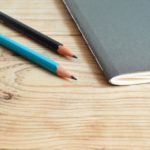 Two Pencils Near Book