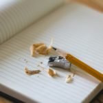 pencil and sharpener on notebook page